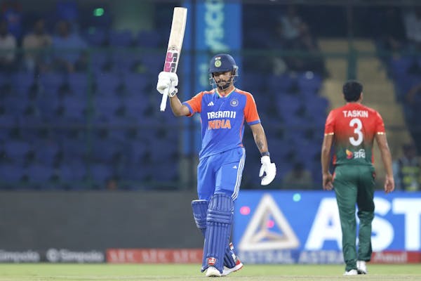 Nitish Kumar Reddy raising his bat after half-century against Bangladesh for India