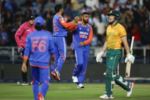 Varun Chakarvarthy of India celebrating wicket of South African batter