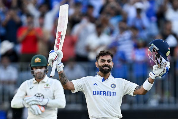 India's Virat Kohli celebrates century vs Australia in Perth