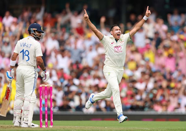 Scott Boland celebrates dismissing Virat Kohli