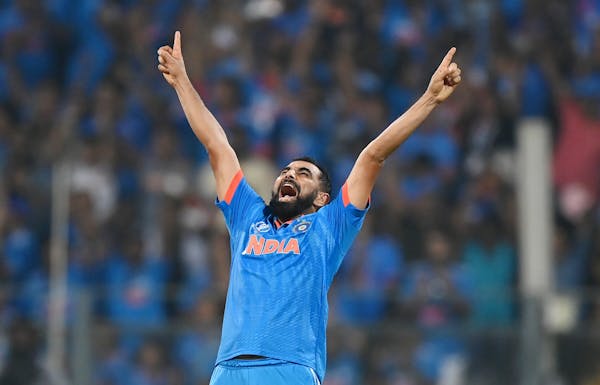 India's Mohammed Shami celebrates a wicket during ICC World Cup 2023